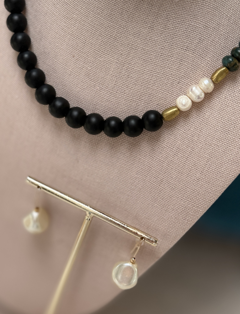 Matte black bead necklace with labradorite, freshwater pearls and gold spacers, detail view