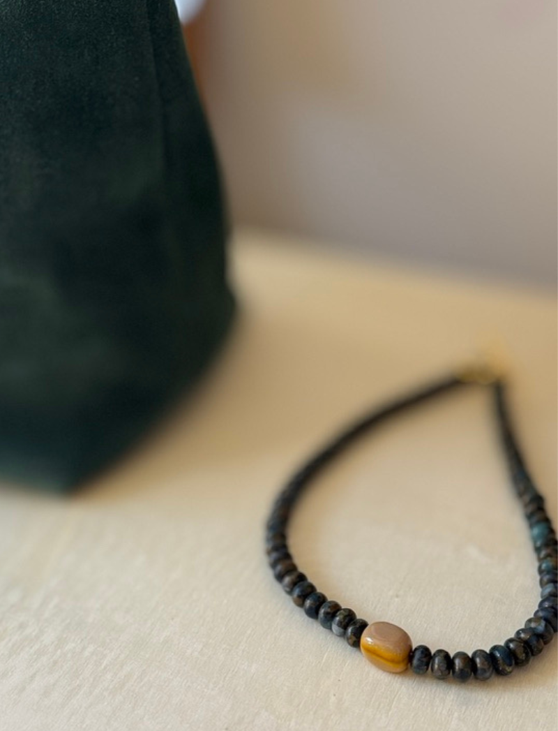 Deep blue-green labradorite bead necklace with honey-colored ceramic bead, alternate view