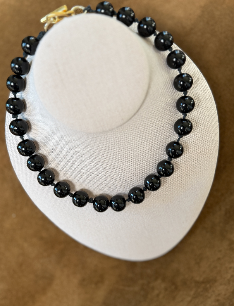 Glossy jet-black knotted bead necklace