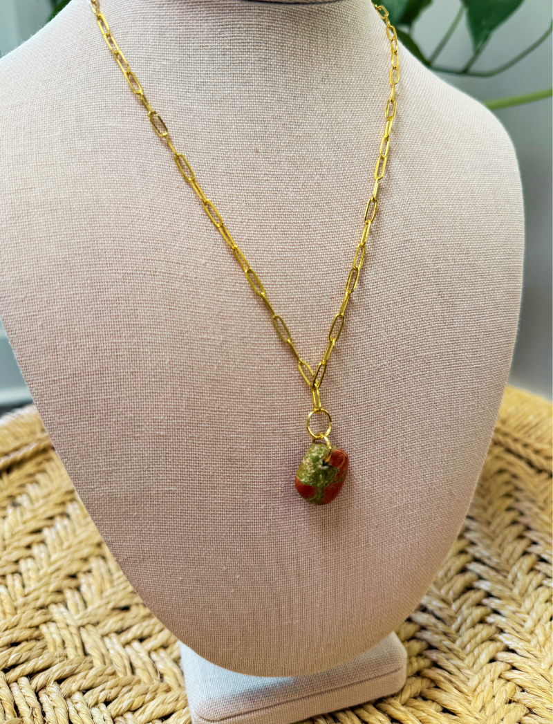 Earth-toned stone pendant on a chunky gold paperclip chain